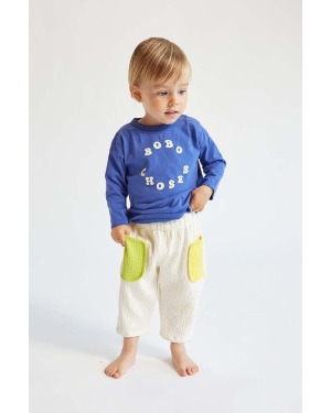 Bobo Choses spodnie bawełniane niemowlęce kolor beżowy wzorzyste